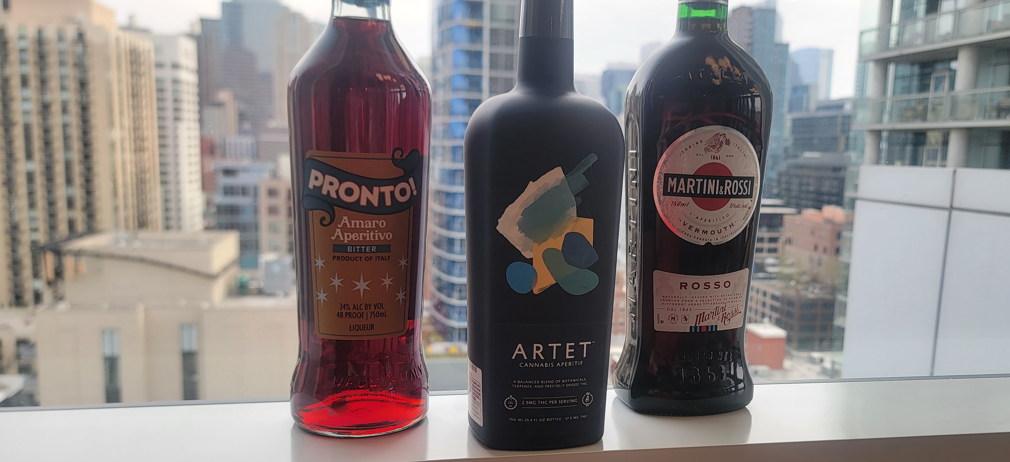 Artet Cannabis Aperitif alongside cocktail mixers